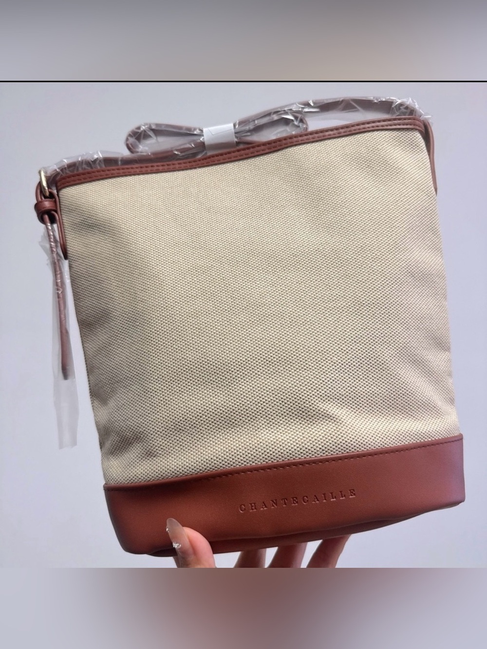 New Chantecaille Cream and Brown Bucket Cross Bodybag